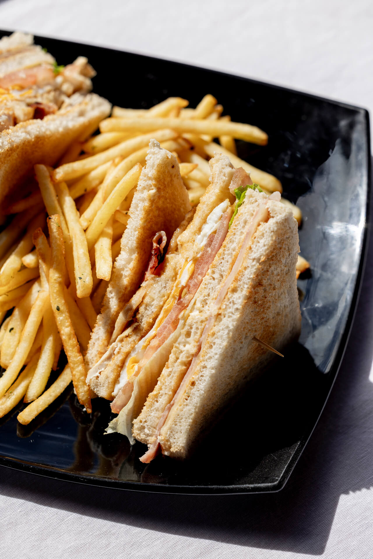 Club Sandwich with fries