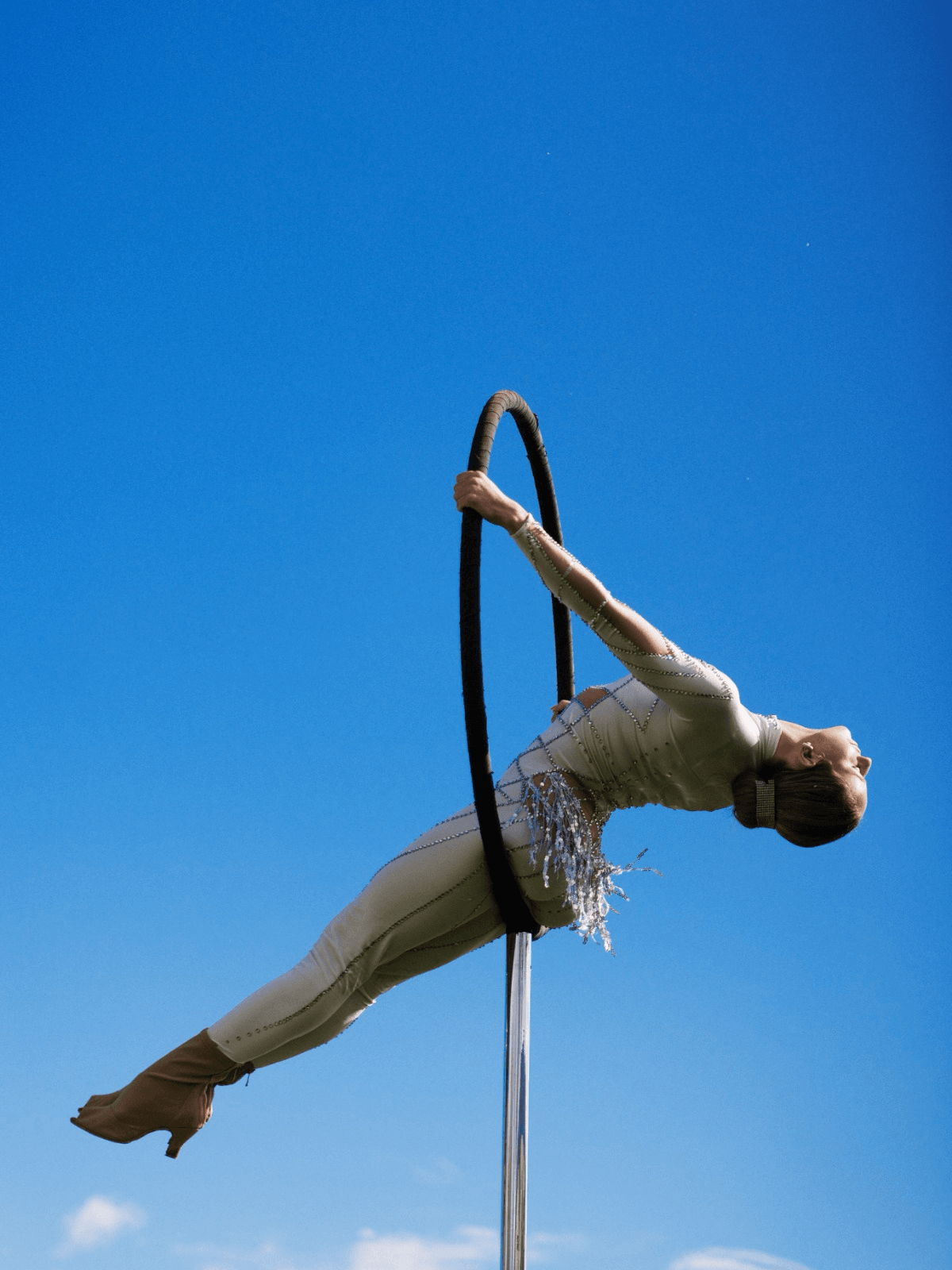 Aerial acrobat performance at Golf del Sur event
