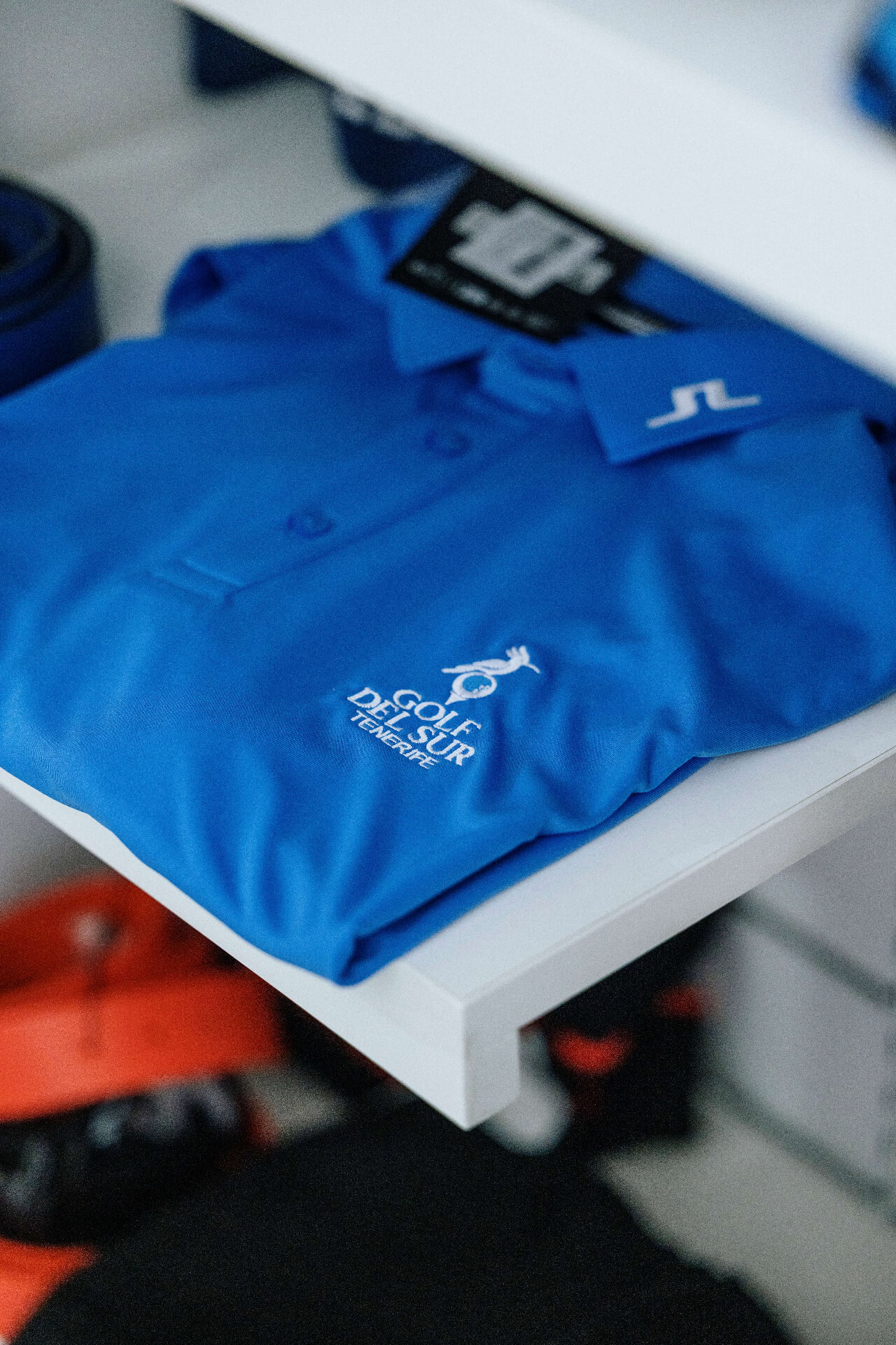 J.Lindeberg blue polo with Golf del Sur branding